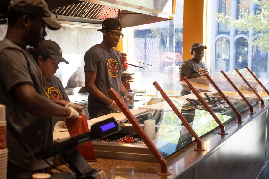 Pancheros team working the line at a franchised location